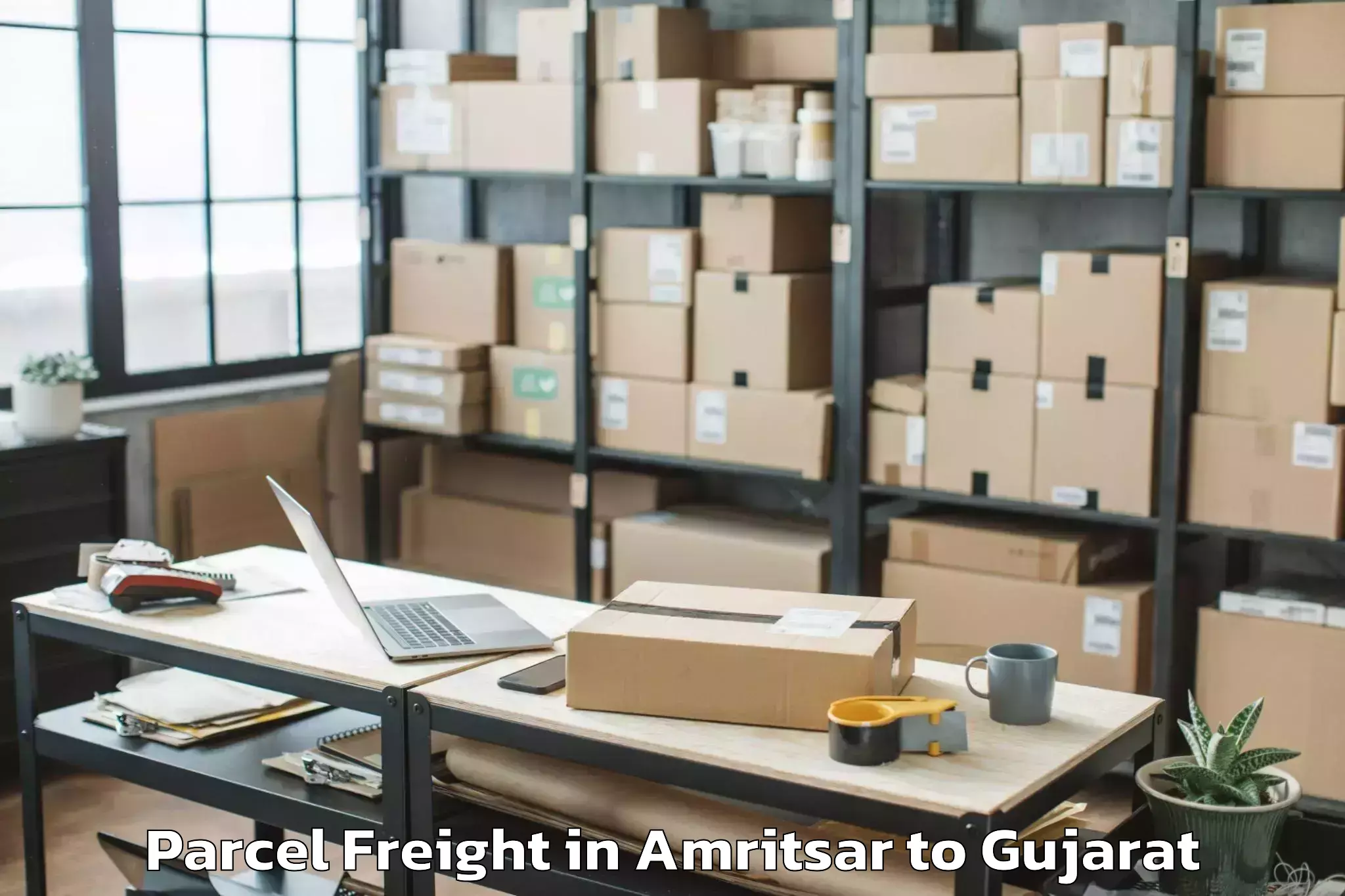 Top Amritsar to Kundla Parcel Freight Available